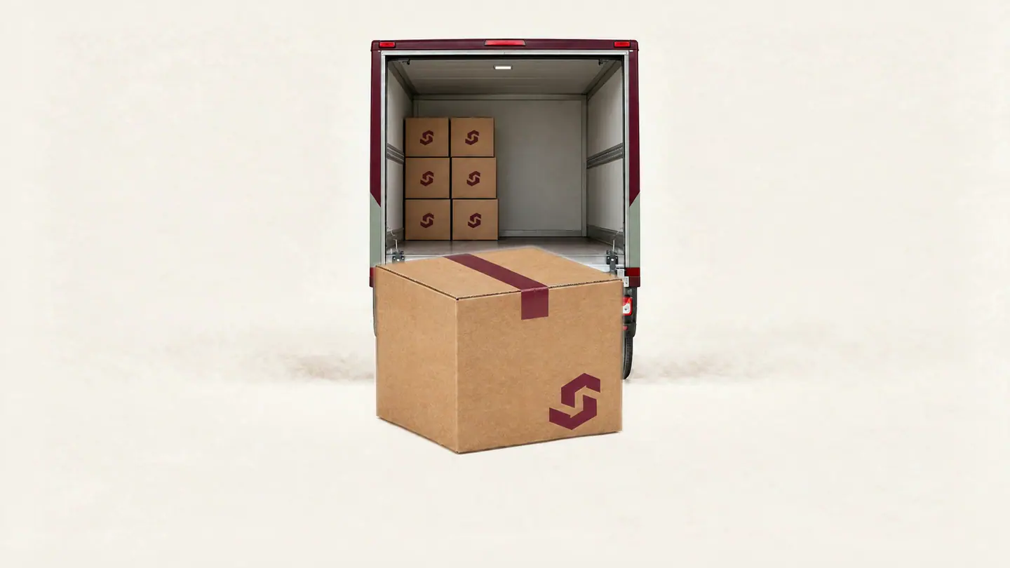 The Smart Flyt moving van arrives and opens its rear door