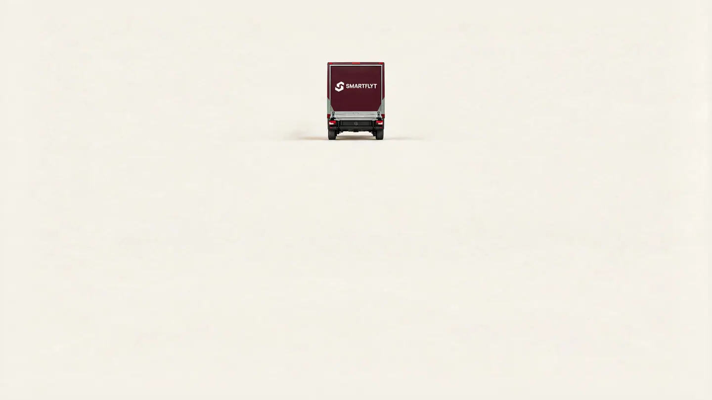 The moving van drives off